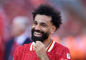 Mohamed Salah sonriente durante el último partido de la temporada