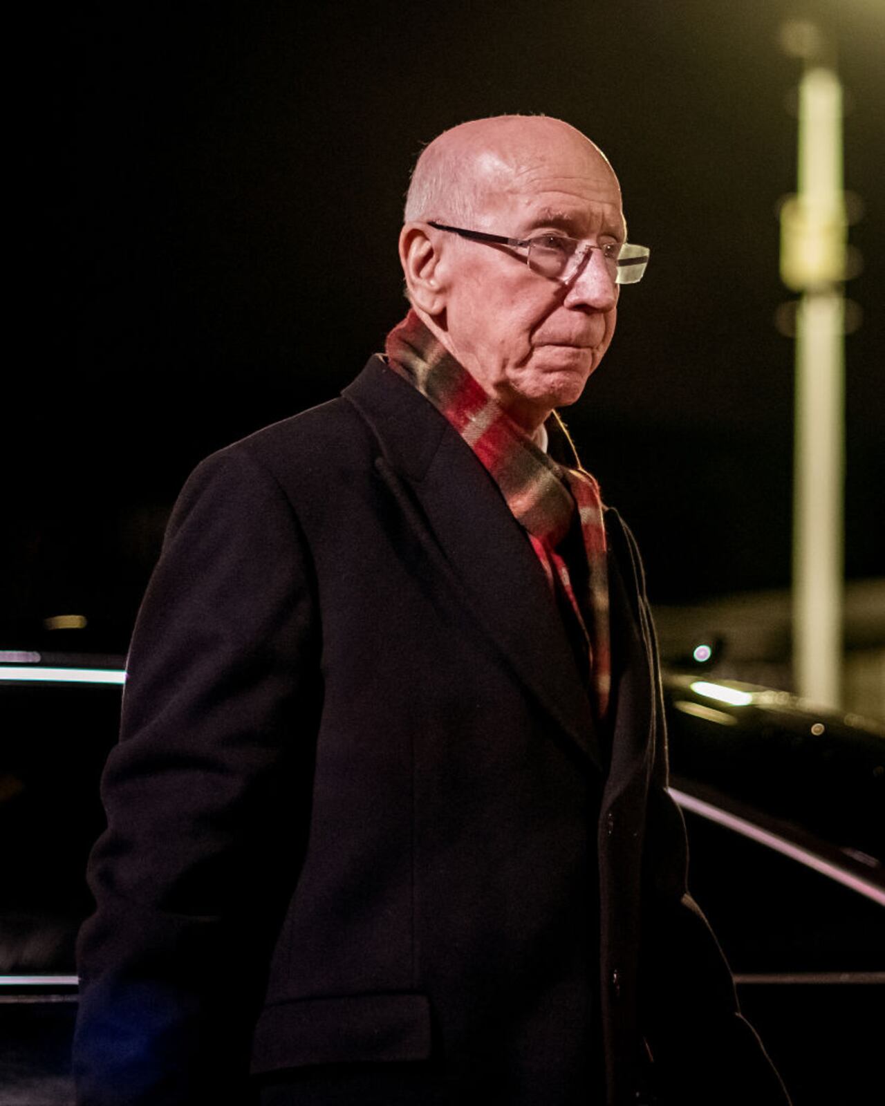 MANCHESTER, ENGLAND - DECEMBER 12: (EDITOR'S NOTE: Image processed using a digital filter) Sir Bobby Charlton of Manchester United arrives ahead of the UEFA Europa League group L match between Manchester United and AZ Alkmaar at Old Trafford on December 12, 2019 in Manchester, United Kingdom. (Photo by Ash Donelon/Manchester United via Getty Images)