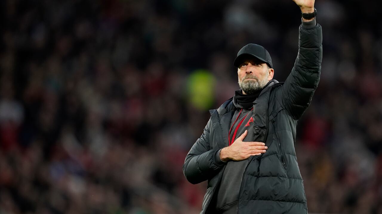 Liverpool's manager Jurgen Klopp greets supporters after the FA Cup quarterfinal soccer match between Manchester United and Liverpool at the Old Trafford stadium in Manchester, England, Sunday, March 17, 2024. Manchester United won 4-3. (AP Photo/Dave Thompson)