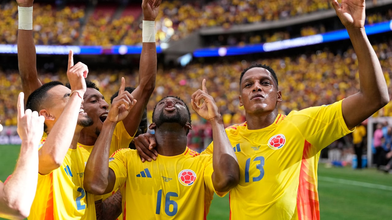 Colombia's Jefferson Lerma, 16, celebrates scoring his side's second goal against Paraguay during a Copa America Group D soccer match in Houston, Texas, Monday, June 24, 2024. (AP Photo/Kevin M. Cox)