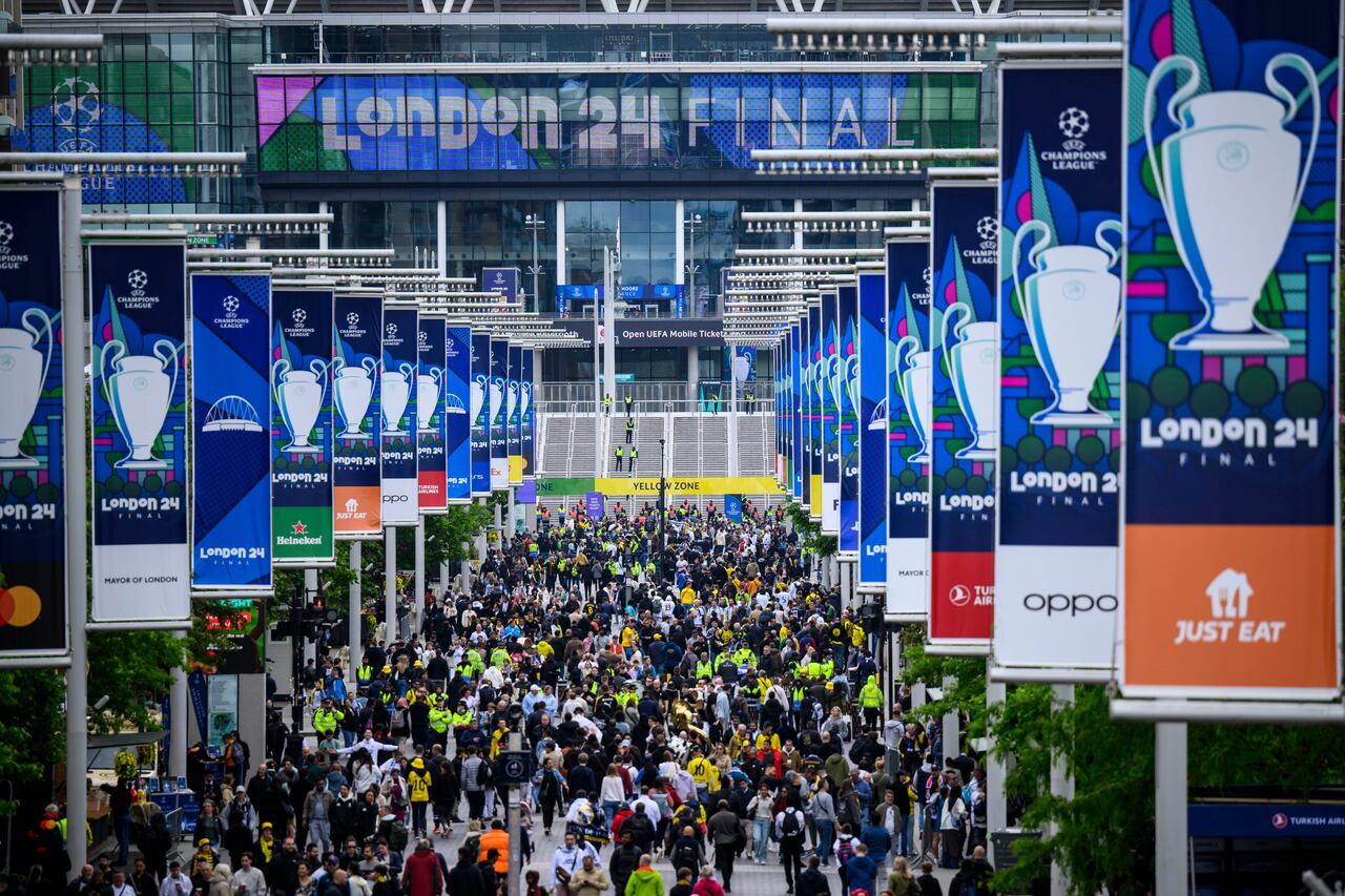 01 June 2024, Great Britain, London: Soccer: Champions League, Borussia Dortmund - Real Madrid, knockout round, final, Wembley Stadium. Soccer fans walk along Olympic Way towards Wembley Stadium. Photo: Tom Weller/dpa (Photo by Tom Weller/picture alliance via Getty Images)