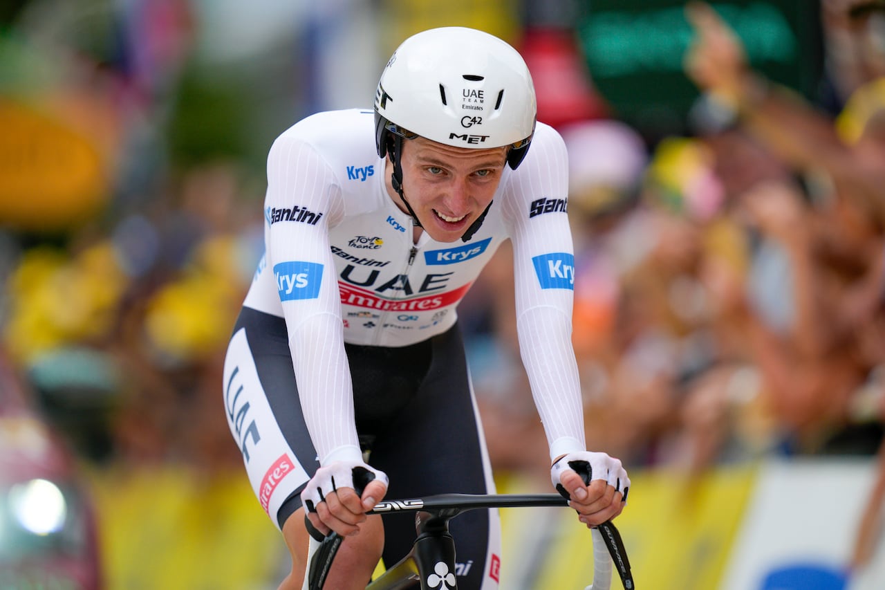 Slovenia's Tadej Pogacar, wearing the best young rider's white jersey, rides during the sixteenth stage of the Tour de France cycling race, an individual time trial over 22.5 kilometers (14 miles) with start in Passy and finish in Combloux, France.