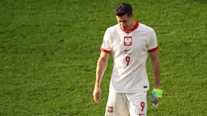 Poland's forward #09 Robert Lewandowski leaves the pitch after the UEFA Euro 2024 Group D football match between Poland and Austria at the Olympiastadion in Berlin on June 21, 2024. (Photo by Ronny HARTMANN / AFP)