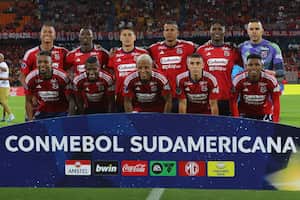 Players of Independiente Medellin pose for a team photo during the Copa Sudamericana group stage second leg football match between Colombia's Independiente Medellin and Bolivia's Always Ready at the Atanasio Girardot stadium in Medellin, Colombia, on May 29, 2024. (Photo by JAIME SALDARRIAGA / AFP)