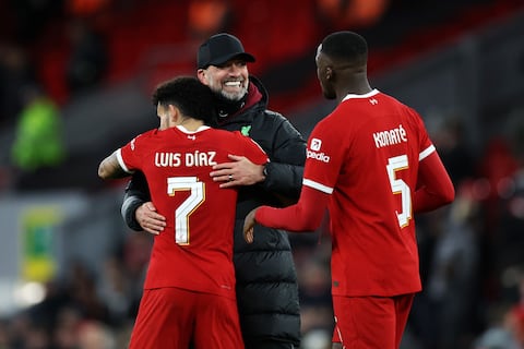 LIVERPOOL, ENGLAND - JANUARY 10: Juergen Klopp, Manager of Liverpool, Luis Diaz and Ibrahima Konate of Liverpool celebrate following the team's victory in the Carabao Cup Semi Final First Leg match between Liverpool and Fulham at Anfield on January 10, 2024 in Liverpool, England. (Photo by Clive Brunskill/Getty Images)