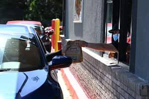 CALIFORNIA, USA - APRIL 03: A McDonald's drive thru is seen in Belmont, United States on April 03, 2023. McDonaldâs reportedly temporarily shuts its U.S. corporate offices ahead of layoffs. (Photo by Tayfun Coskun/Anadolu Agency via Getty Images)