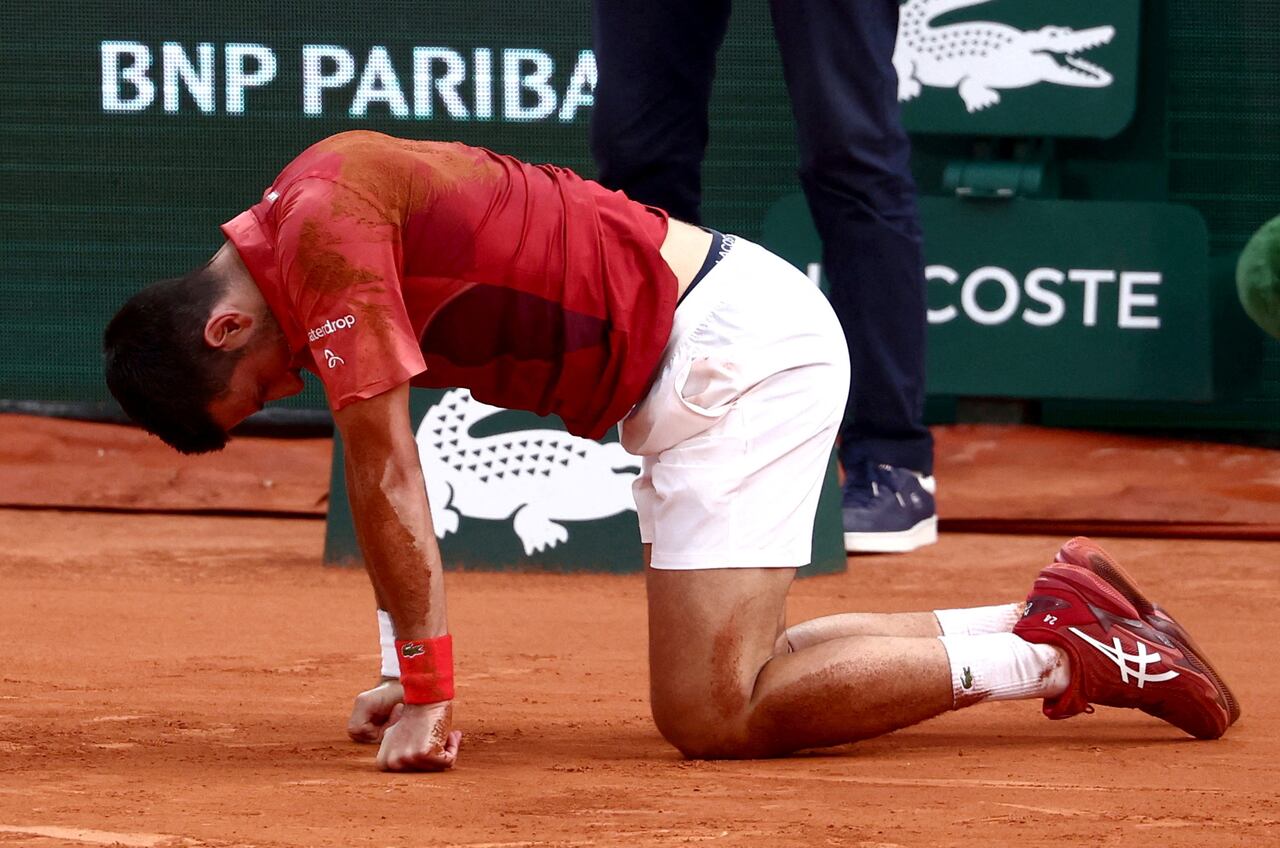 Tennis - French Open - Roland Garros, Paris, France - June 3, 2024 Serbia's Novak Djokovic reacts after falling during his fourth round match against Argentina's Francisco Cerundolo  REUTERS/Yves Herman