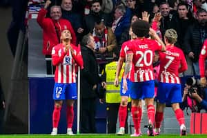 Atletico Madrid's Samuel Lino celebrates after scoring the opening goal during the Copa del Rey round of 16 soccer match against Real Madrid in Madrid, Spain, Thursday, Jan. 18, 2024. (AP Photo/Manu Fernandez)