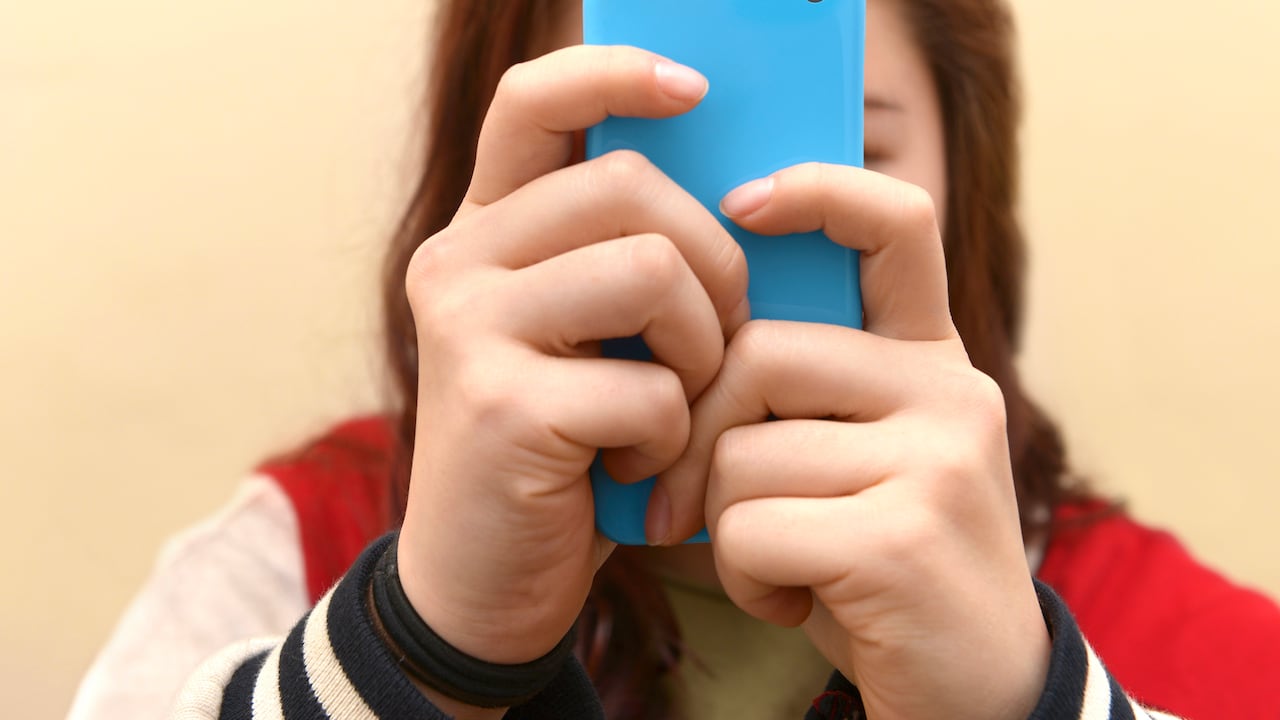 Close up of a teenager on her smartphone