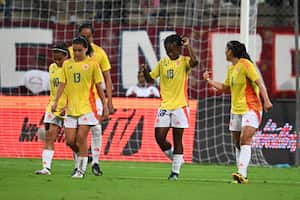 Colombia's Linda Caicedo (C) celebrates after scoring against Venezuela during the women's friendly football match between Venezuela and Colombia at the Metropolitano stadium in Barquisimeto, Venezuela on May 30, 2024. (Photo by Federico PARRA / AFP)